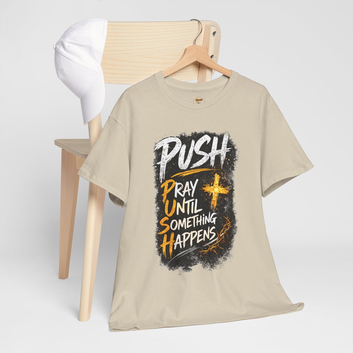 Beige t-shirt with motivational text design on a white background